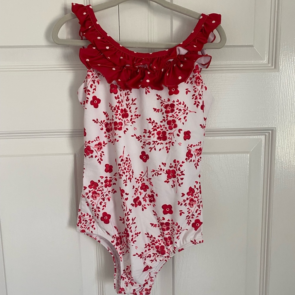 Red and white floral girls swimsuit. New with tags. Sweet honey clothing
